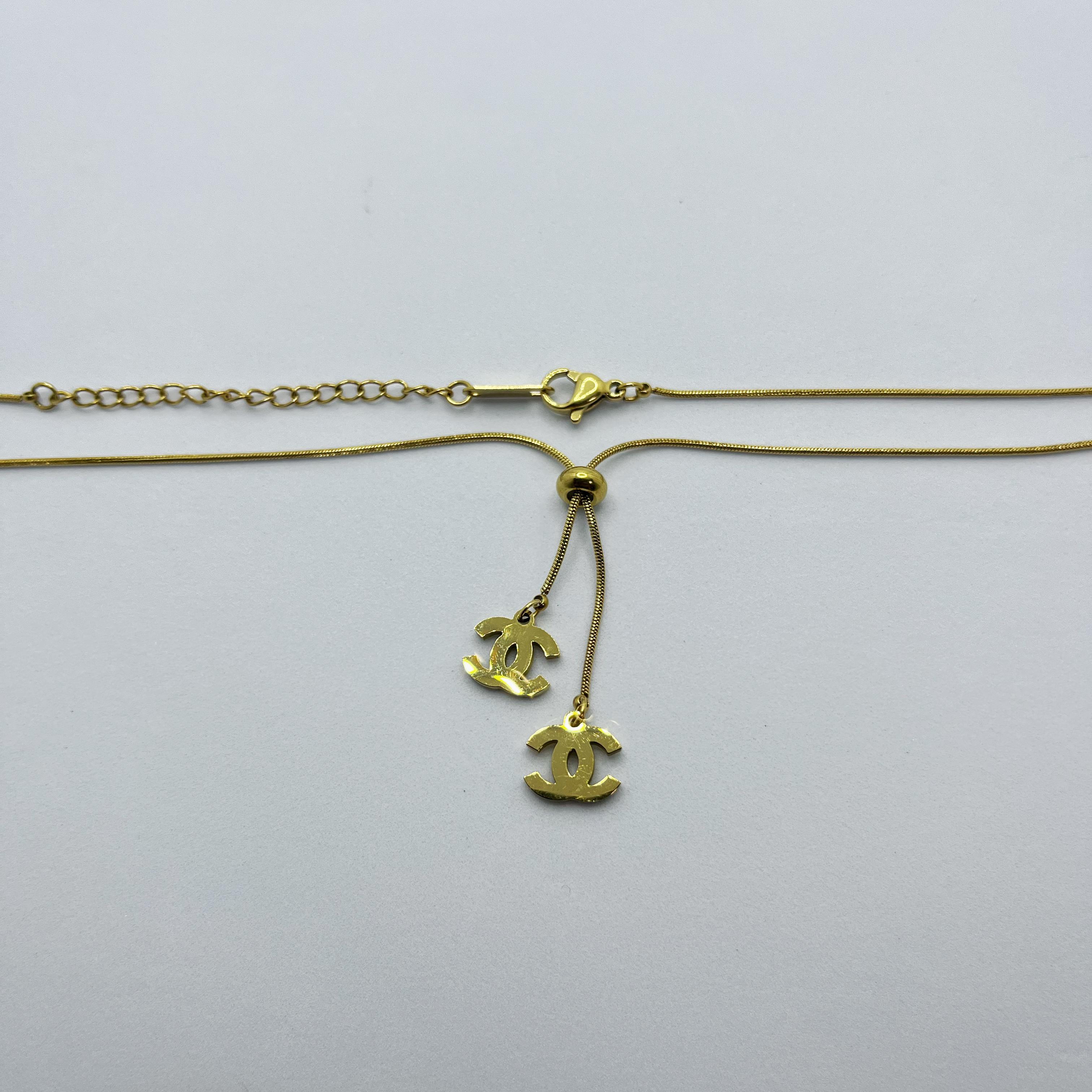 CADENA CHANEL 2 DIJES MUJER